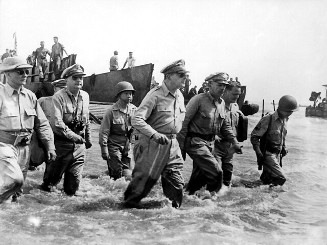 General MacArthur wading ashore , 1950.
